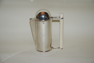 A silver coffee-pot Ivory handle