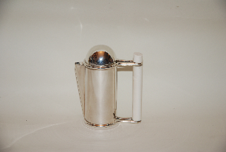 A silver milk-pot-Ivory handle